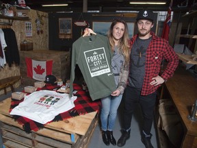 Meghan Kraft and Daniel Phillips own and operate a clothing store called dpms at the Western Fair Market in London, Ontario on Tuesday, December 16, 2014. (DEREK RUTTAN, The London Free Press)