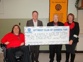 Submitted photo: The Optimist Club of Sombra Township presented a cheque for $5,000 to the C-K Family Health Team to go toward an examination room at the Wallaceburg site, at their monthly meeting held in Port Lambton recently.  The donation is part of the fundraising committee’s continuing effort to raise $200,000 for the expansion of the Wallaceburg site where three doctors, new to the area, are located. Making the presentation, from left to right, Sombra Optimist President Carla Aarssen, C-K Family Health Team fundraising members Sheldon Parsons and Lyn Tapp and Sombra Optimist past president Johanne Leach.