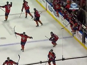 The Florida Panthers players celebrate winning the longest shootout in NHL history. (NHL/YouTube screengrab)