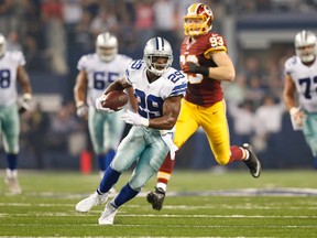 Dallas Cowboys running back DeMarco Murray runs after a catch against the Washington Redskins at AT&T Stadium on Oct. 27, 2014. (Matthew Emmons/USA TODAY Sports)