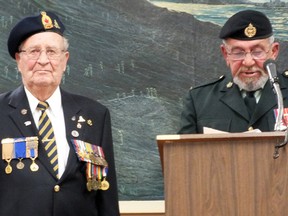 Sidney McLean (left) received the French Legion of Honour Medal Tuesday night for his role in the Second World War. The Imperial Oil retiree was the only member of his original gun crew to survive the war. To the right is retired Major Eugene Smith, who led the ceremony, held at the Petrolia branch of the Royal Canadian Legion. (BRENT BOLES, QMI Agency)