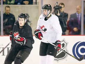 Kingston Frontenacs forward Lawson Crouse, right, takes part in a practice at the Canadian junior hockey team selection camp in St. Catharines this week. (QMI Agency)