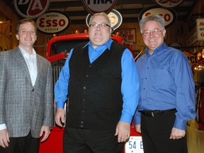 Elgin-Middlesex-London MPP Jeff Yurek, left, MP Joe Preston and Dowler-Karn chief financial officer Dan Kelly stand in the Dowler-Karn museum on Wednesday, Dec. 17, 2014. All were on hand for the announcement of a jobs grant for Dowler-Karn. (Ben Forrest, Times-Journal)