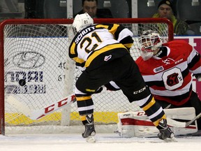 Kingston Frontenacs’ Samuel Schutt scores the first goal of the game on Ottawa 67's goalie Leo Lazarev during Ontario Hockey League action at the Rogers K-Rock Centre on Wednesday night. Ottawa won 2-1. (Ian MacAlpine/The Whig-Standard)