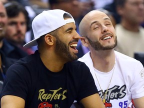 Drake enjoys "Drake night" at the Air Canada Centre on Wednesday night. (Dave Abel/Toronto Sun)