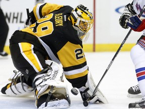 Pittsburgh Penguins goalie Marc-Andre Fleury (29) makes a save against the New York Rangers earlier this season. (Charles LeClaire-USA TODAY Sports)