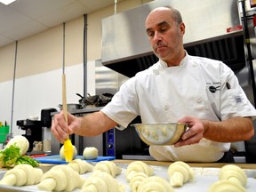 Steve James, a program manager/chef at the London Training Centre, prepares croissants Dec. 17, 2014. CHRIS MONTANINI\LONDONER\QMI AGENCY
