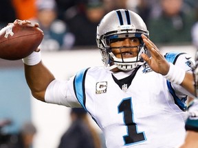 Carolina Panthers quarterback Cam Newton (1) throws the ball against the Philadelphia Eagles during the second half in Philadelphia, Pennsylvania November 10, 2104.  (REUTERS)