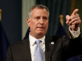 New York City Mayor Bill de Blasio presents the 2015 city budget at City Hall in New York, May 8, 2014. 
REUTERS/Seth Wenig/Pool