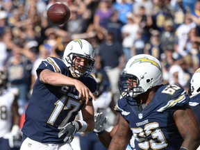 San Diego Chargers quarterback Philip Rivers (17) throws a pass during the first half against the St. Louis Rams at Qualcomm Stadium. (Robert Hanashiro-USA TODAY Sports)