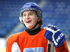 Sudbury Wolves rookie forward Michael Pezzetta shares a laugh with a teammate during team practice on Thursday afternoon. Pezzetta and his fellow rookies have been a big part of the team's success on the penalty kill of late.