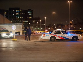 Police tape surrounds an area where a man was shot at Agincourt Mall on Dec. 18, 2014. (Victor Biro/Toronto Sun)