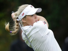 Brooke Henderson of Smiths Falls hits a shot during the front nine of the final round of the World Junior Golf Championship at Angus Glen golf course on Oct. 1, 2014. (Craig Robertson/QMI Agency)