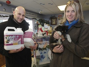 Ryan Caligiuri and Robin Dick delivered 450 lbs of cat litter, 1000 lbs of newspaper, and some cash to Winnipeg Pet Rescue Shelter Thursday, Dec. 18, 2014.