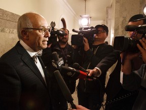 Health Minister Stephen Mandel speaks to the media at the Alberta Legislature in Edmonton, Alta., on Monday, Nov. 24, 2014. Ian Kucerak/Edmonton Sun