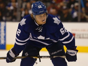 Toronto Maple Leafs forward William Nylander chews on his mouthguard before a faceoff during a pre-season game against the Detroit Red Wings on October 4, 2014. (Jack Boland/Toronto Sun/QMI Agency)