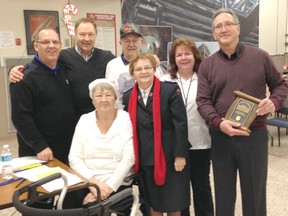 Members of Local 663 lent a big helping hand to the Salvation Army in Sarnia Friday when they helped deliver 120 hampers and toys to families. The union local also provided a cheque of approximately $64,000. In the front row: long-time Local 663 volunteer Doreen Kerwin; and Rita Price, retired community and family services co-ordinator for the Salvation Army. In the back row: Major Rick Pollard of the Salvation Army, Bob Sauve of Local 663, Bill Kerwin, a retired Local 663 member, Sue Platt, community and family services co-ordinator for the Salvation Army, and Ross Tius, business manager for Local 663.
SUBMITTED PHOTO