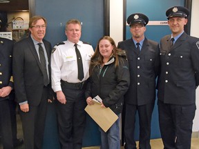 Special life-saving commendations from the OPP were presented Wednesday in Tillsonburg to Tracey Dinsmore, and Tillsonburg Fire and Rescue Services firefighters Jason Bezaire and Alden Turcotte, for their efforts in saving two lives on May 24-25th in Tillsonburg. From left are Fire Chief Jeff Smith, Tillsonburg Mayor Stephen Molnar, Oxford OPP Inspector Tim Clark, Dinsmore, Bezaire and Turcotte. (CHRIS ABBOTT/TILLSONBURG NEWS)