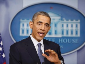 U.S. President Barack Obama answers a question about the cyberattack on Sony Pictures after his end of the year press conference in the briefing room of the White House in Washington, December 19, 2014. REUTERS/Larry Downing