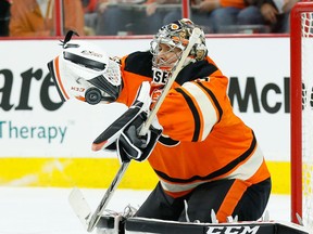 Philadelphia Flyers goalie Steve Mason makes a save against the New York Rangers during the first period at Wells Fargo Center. (Bill Streicher/USA TODAY Sports)