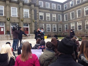 Jude Ashburn and Jordan Roberts from the South House Sexual and Gender Resource Centre in Halifax speak at a Dalhousie University protest on Dec. 19.(Yalitsa Riden/Twitter)