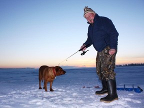 Neil and Penny ice fishing at Lake Wabamun. (SUPPLIED)