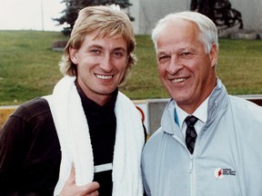 L.A. Kings captain Wayne Gretzky and hockey legend Gordie Howe pose for a photo on Oct. 14, 1989 outside the Northlands Coliseum in Edmonton, Alta.  (Edmonton Sun/QMI Agency)