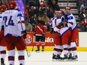 Team Russia celebrates Alexander Sharov goal against team Canada during a pre-tournament exhibition game ahead of the IIHF World Junior Hockey Championships at the Air Canada Centre on December 19, 2014. (Dave Abel/Toronto Sun/QMI Agency)