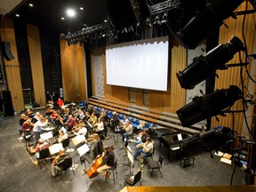Orchestra London, seen rehearsing earlier this month at Centennial Hall, has a debt of more than $1 million. (CRAIG GLOVER, The London Free Press)