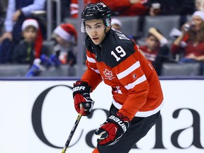 Michael Dal Colle of Team Canada looks for a pass against Team Russia during a pre-tournament exhibition game ahead of the IIHF World Junior Hockey Championships at the Air Canada Centre in Toronto on Friday December 19, 2014. (Dave Abel/QMI Agency)