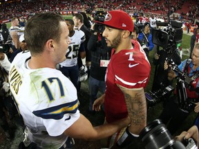 San Francisco 49ers quarterback Colin Kaepernick (7) congratulates San Diego Chargers quarterback Philip Rivers (17) after the game at Levi's Stadium. The Chargers defeated the 49ers 38-35 in overtime. (Kirby Lee-USA TODAY Sports)