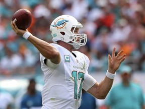 Dolphins' Ryan Tannehill threw four passing touchdowns in his team's win over the Vikings on Sunday. (GETTY IMAGES)