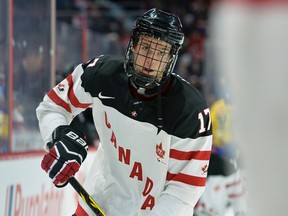 Canada’s #17 Connor McDavid warms up before the starting of their pre-tournament IIHF hockey game against Sweden at the Canadian Tire Centre in Ottawa on Sunday, Dec. 21, 2014. (Matthew Usherwood/QMI Agency)