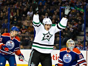 Dallas' Shawn Horcoff (10) celebrates a goal during the first period of the Edmonton Oilers' NHL hockey game against the Dallas Stars at Rexall Place in Edmonton, Alta., on Sunday, Dec. 21, 2014. Codie McLachlan/Edmonton Sun/QMI Agency