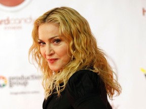 Madonna arrives to launch her new Toronto gym Hard Candy and poses for media on Tuesday February 11, 2014. Michael Peake/QMI Agency