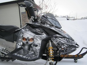 A 2008 Summit Everest Ski Doo -- emblazoned with custom skull graphics -- and 2012 Wildcat side-by-side were taken from an unattached garage in a property at Norris Beach on Dec. 2, say Wetaskiwin RCMP.