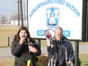 Vanessa Gray of Aamjiwnaang and Sarnia Against Pipelines (ASAP) speaks at a Chemical Valley Flash Powwow the group held Monday. The event included a sacred fire and a prayer for people and the environment. TYLER KULA/ THE OBSERVER/ QMI AGENCY