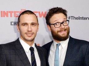 James Franco and Seth Rogen pose during premiere of the film "The Interview" in Los Angeles, California in this December 11, 2014 file photo. REUTERS/Kevork Djansezian/Files