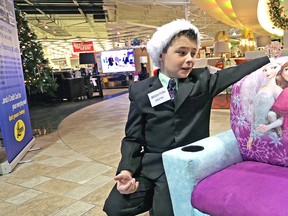 Brighton Rogers, a Grade 3 student from St. Catharines, went to work at Leon’s Furniture store in Niagara-on-the-Lake. He wanted to work there to get a Disney Frozen Kid’s Recliner for his sister. Leon’s wanted to help the boy so they made his Christmas ‘wish’ come true. Mike DiBattista/Niagara Falls Review/QMI Agency