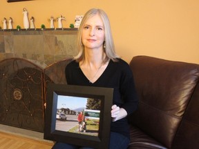 Marybelle Campbell with photo of her son Alex Lozanski. (DALE CARRUTHERS, The London Free Press)