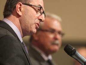 Agriculture Minister Ron Kostyshyn (left) had some additional duties handed to him on Tuesday by Premier Greg Selinger. (Chris Procaylo/Winnipeg Sun file photo)