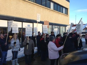 A group of Lac Ste. Anne County residents are forming a new society to examine the county's decisions making. Many of its members have previously protested the county's decisions with regards to its new administrative building, a rally from December 2014 on the issue pictured above (File photo).