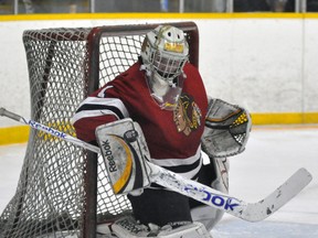Dan Skinner, making his first junior ‘C’ start at home to Hanover Dec. 20, makes a save in the Mitchell Hawks’ 7-1 loss. ANDY BADER/MITCHELL ADVOCATE