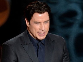 Actor John Travolta speaks onstage during the Oscars at the Dolby Theatre on March 2, 2014 in Hollywood, California.  Kevin Winter/Getty Images/AFP