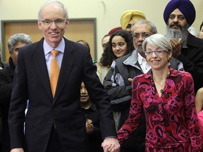 Manitoba NDP leadership candidate Steve Ashton (l) and his wife Hari Dimitrakopoulou-Ashton arrive at a press conference in Winnipeg Man. Tuesday December 23, 2014 to announce that he will run for the party leadership. 
Brian Donogh/Winnipeg Sun/QMI Agency