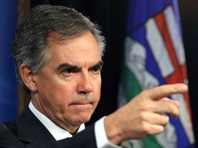 Alberta Premier Jim Prentice speaks to the media on his government to Improve accountability and entitlement during a news conference at the Legislature in Edmonton, Alberta on September 24, 2014. Perry Mah/Edmonton Sun/QMI Agency