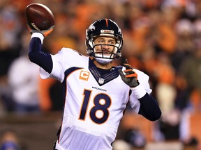 Denver Broncos quarterback Peyton Manning throws a pass during the first quarter against the Cincinnati Bengals at Paul Brown Stadium. (Andrew Weber/USA TODAY Sports)