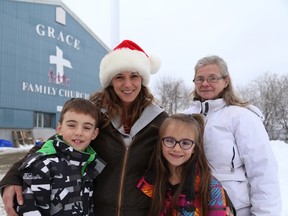 Gino Donato/The Sudbury Star
Shawn Labelle with her kids Xavier Ducharme and Desiree Ducharm,e and mother Claire Guenette, who will all be helping with the Missfit Diner on Christmas day.