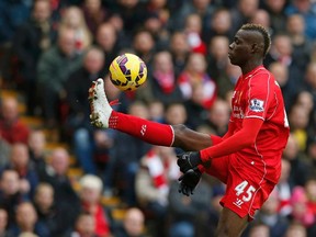 Liverpool's Mario Balotelli controls the ball during English Premier League action against Chelsea at Anfield in Liverpool, November 8, 2014. (REUTERS/Phil Noble)