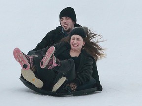 If tobogganing is a holiday tradition in your family, your chances of being able to do it will be a lot better after Christmas morning. A cold front will blow in and chase away the warmer, rainy days of the past week. These kids were out enjoying the snowy conditions at the Kanata Recreation Centre Tuesday Dec 23,  2014. (Tony Caldwell/Ottawa Sun/QMI Agency)